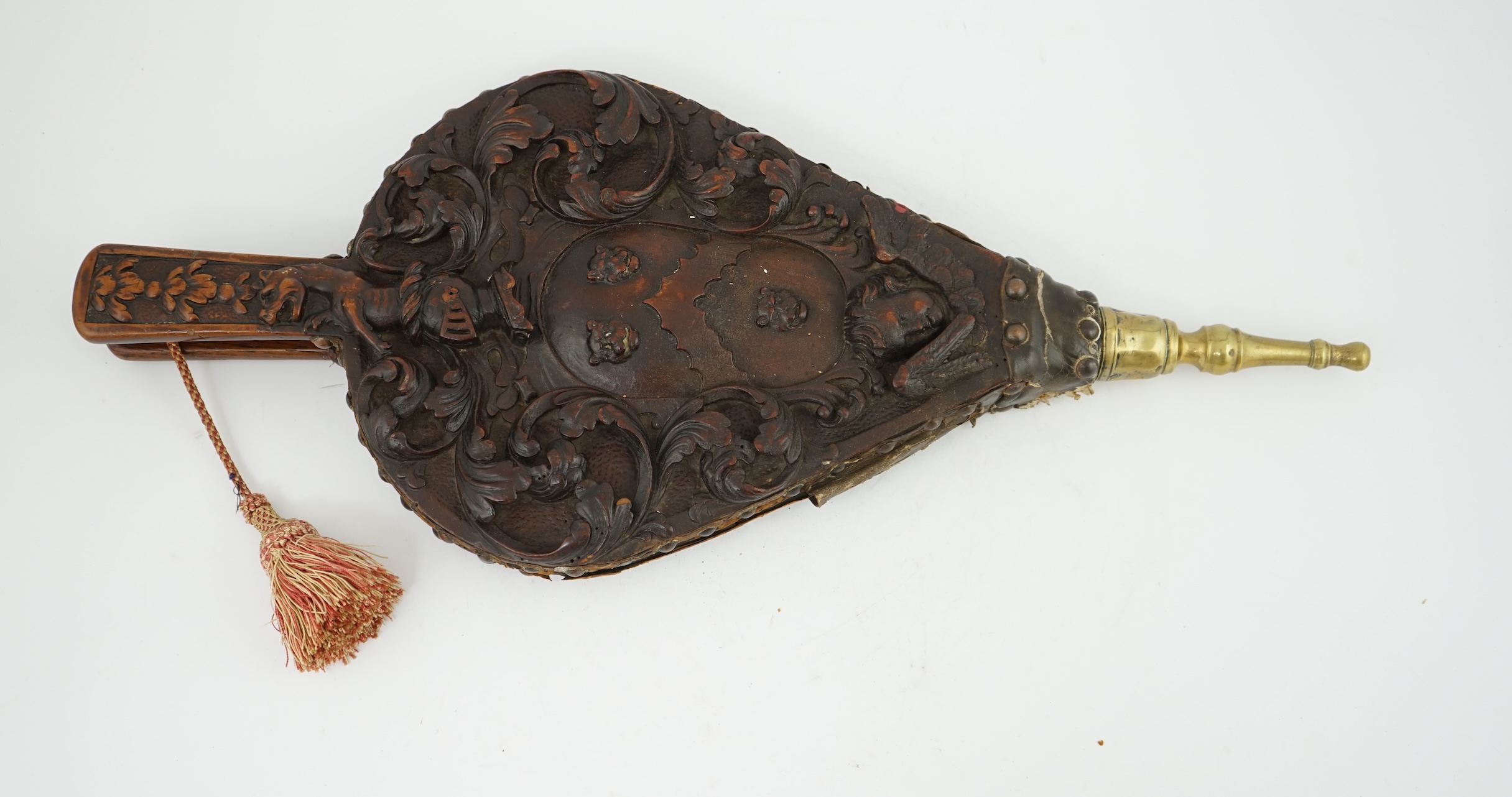 A pair of 17th century carved walnut and oak bellows